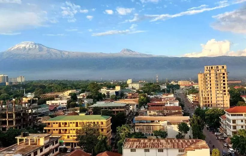 Aerial view of Moshi town with Mount Kilimanjaro in the background