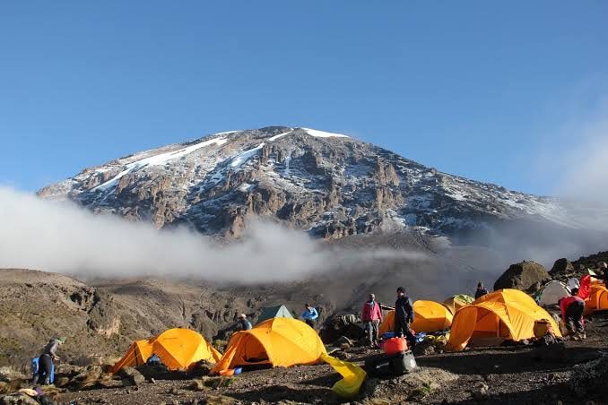 Kilimanjaro's icy summit above the clouds